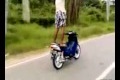 Insane Guy Rides His Scooter Backwards And Performs Tricks 