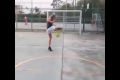 Girl in high heels skillfully playing football